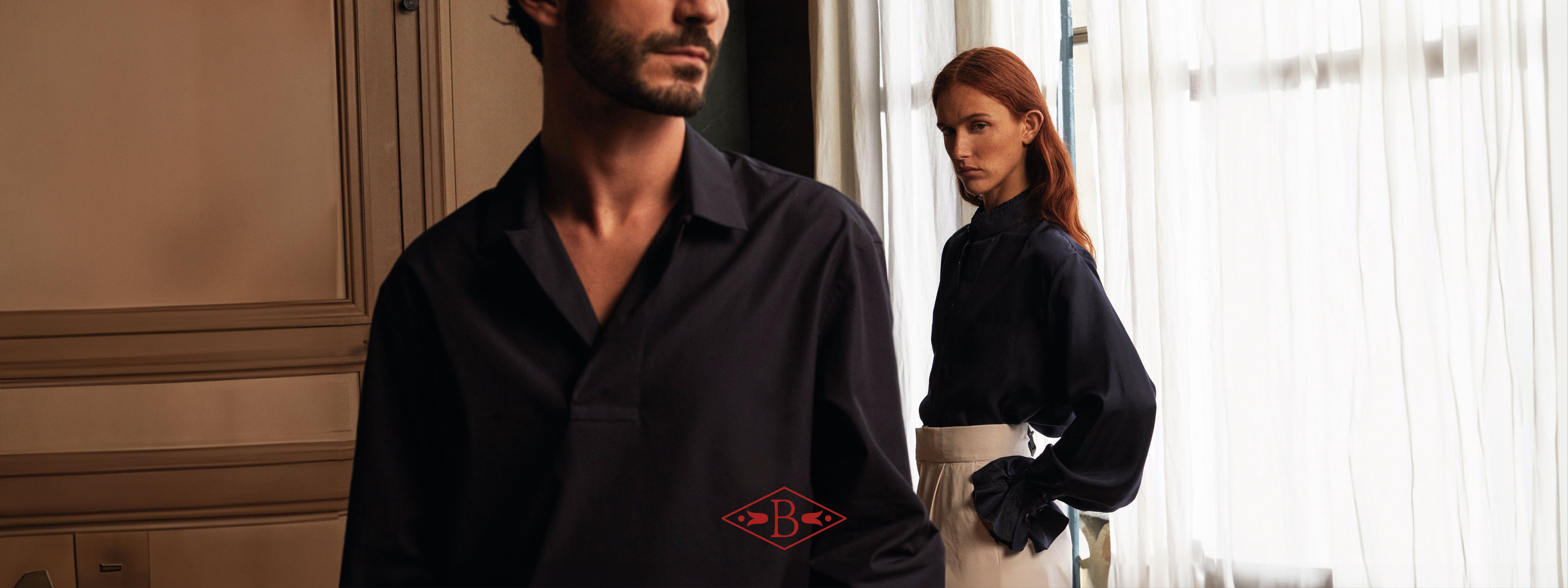 Photographie d'un homme et d'une femme portant des chemises de la marque Bourrienne Paris X